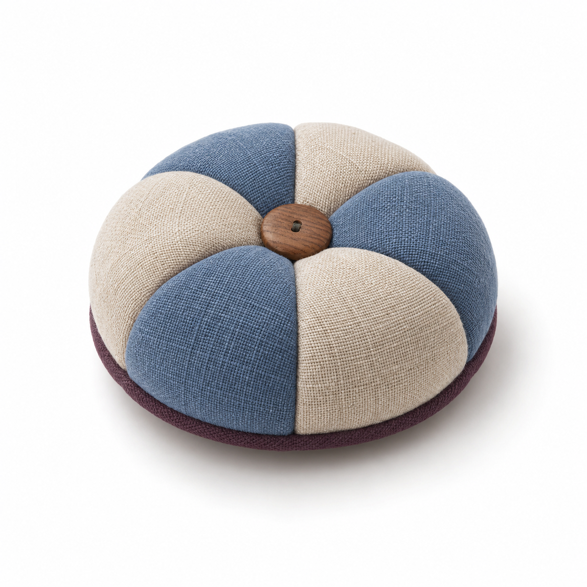 Blauw-beige speldenkussen met houten knoop